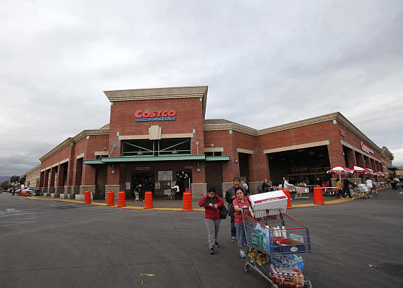 Shoppers push a trolley outside a Costco Wholesale store in Los Angeles, California.