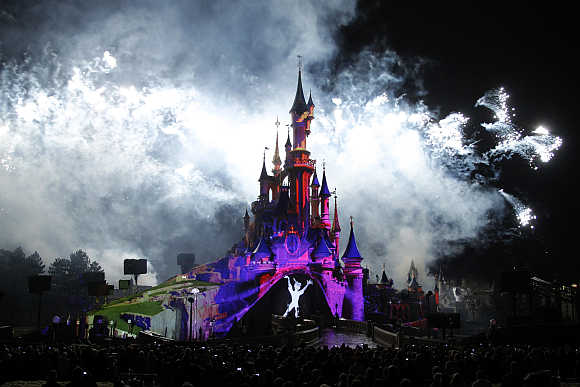 Crowd watches the premiere of Disney Dreams show as part of the 20th anniversary celebrations of Disneyland Resort in Marne-la-Vallee, outside Paris, France.