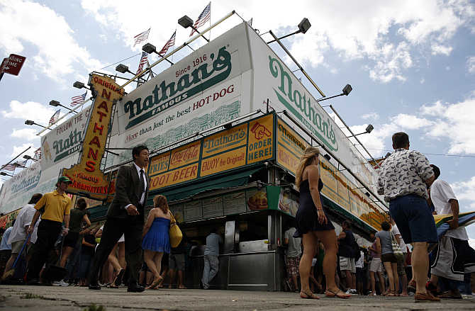 Customers at Nathan's hot dog stand in the Coney Island section of New York, United States.