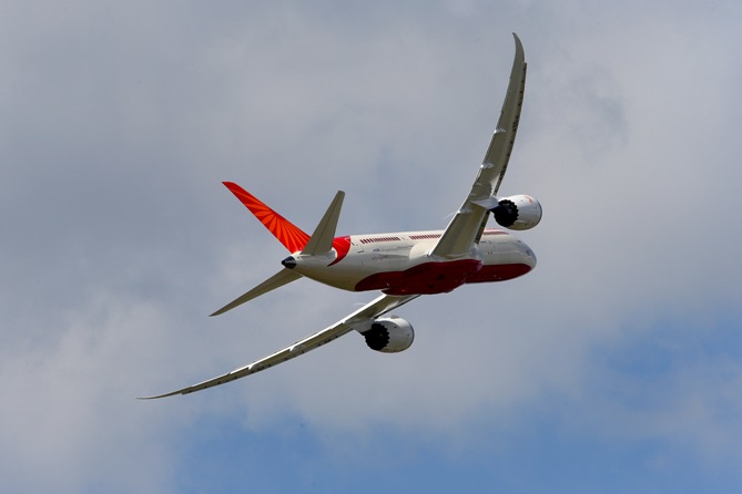 An Air India Airlines Boeing 787 dreamliner takes part in a flying display.