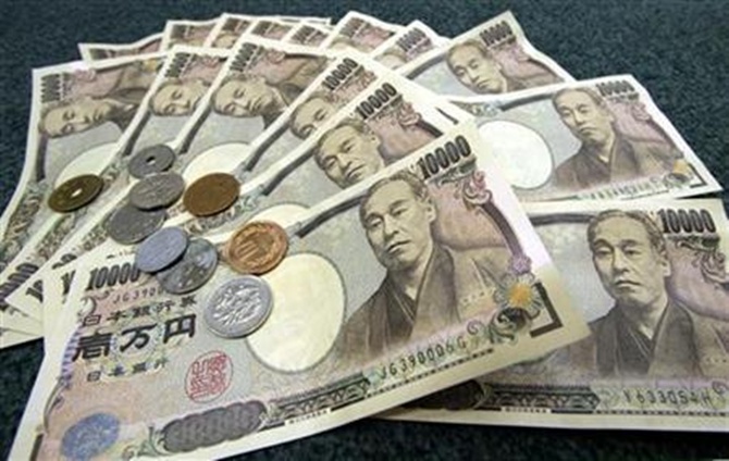 Japanese 10,000 yen bank notes and coins.