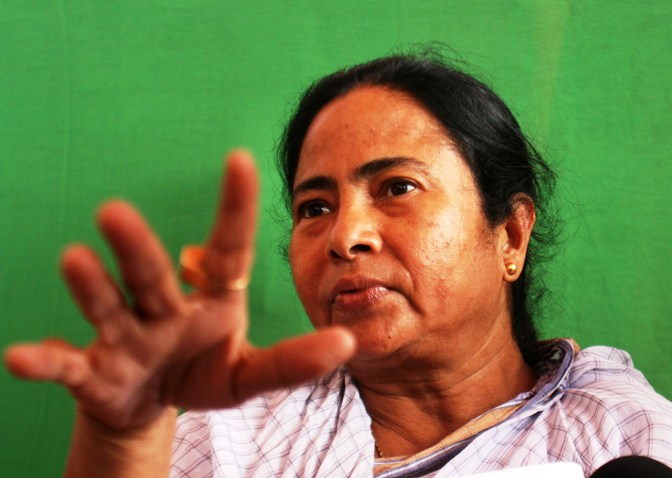 A file photograph shows Trinamool Congress chief and West Bengal Chief Minister Mamata Banerjee speaking with the media during a protest in front of the main entrance of the Tata car plant in Singur.