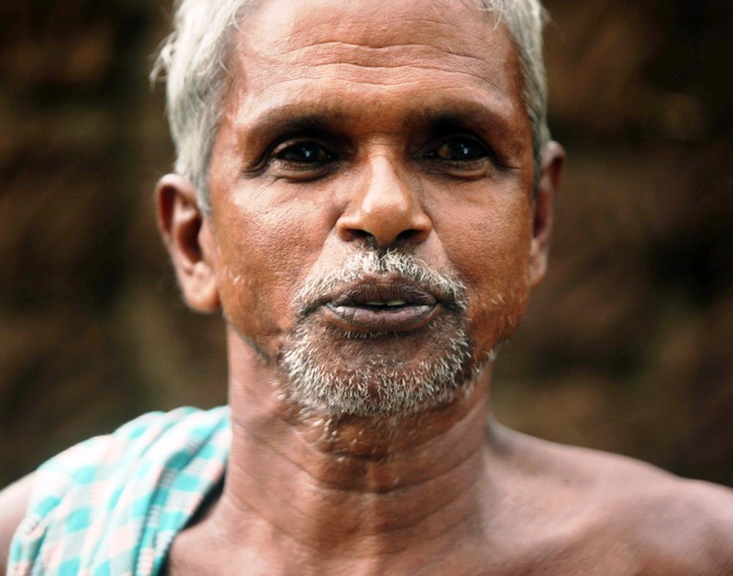 Laxman Das, an elderly farmer, says he lost his land and was refused compensation.
