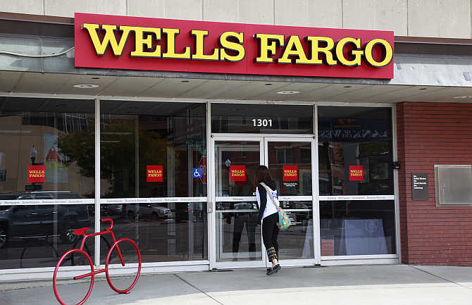 A customer enters the Wells Fargo bank branch in Golden, Colorado.