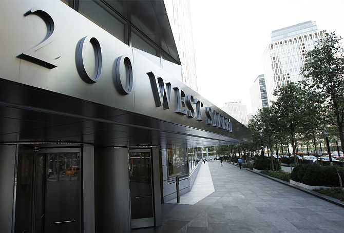 A sign shows the address of the Goldman Sachs headquarters building in New York.