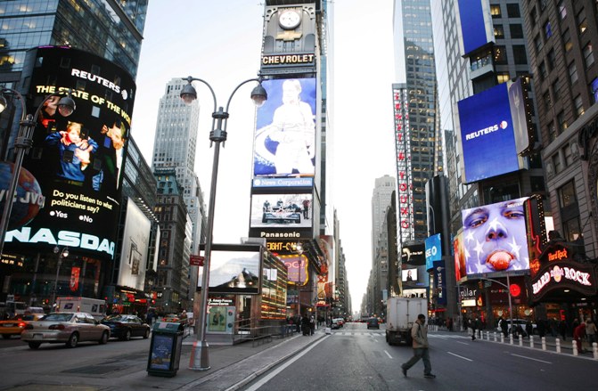 A photo from the Reuters archive shows Reuters screens in Times Square in New York.