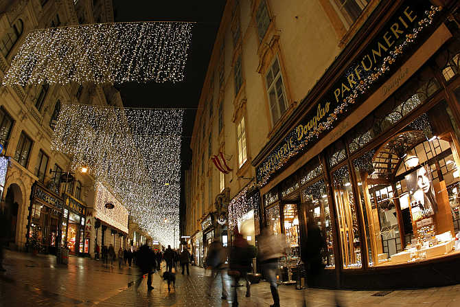 Christmas decorations illuminate a shopping street in the centre of Vienna, Austria.