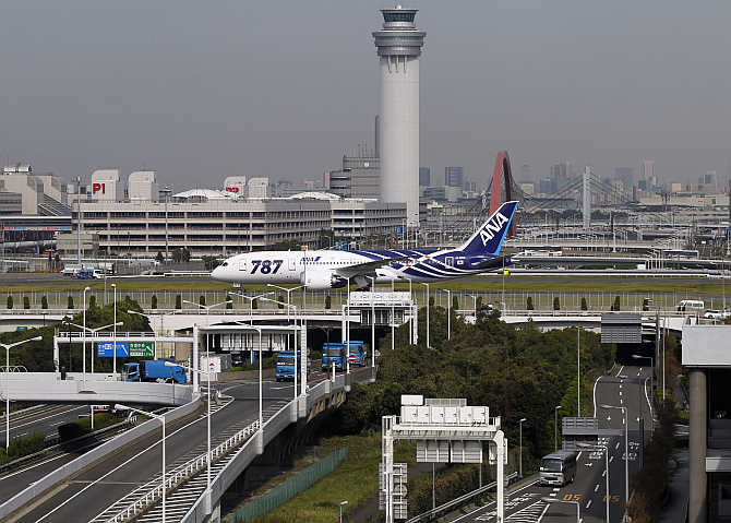 A Boeing 787 Dreamliner aircraft taxis after landing at Haneda airport in Tokyo, Japan.