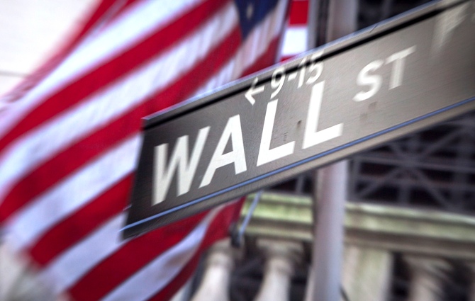 A Wall Street sign is pictured outside the New York Stock Exchange in New York.