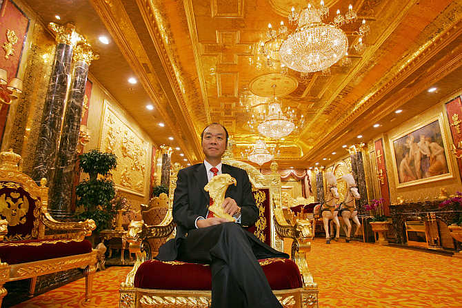 Lam Sai-wing, Chairman, Hang Fung Gold Technology Group, at an exhibition hall decorated with two tonnes of gold next to his jewellery shop in Hong Kong.