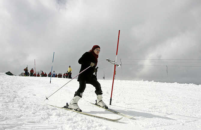 A woman learns to ski in Gulmarg, 55km west of Srinagar.
