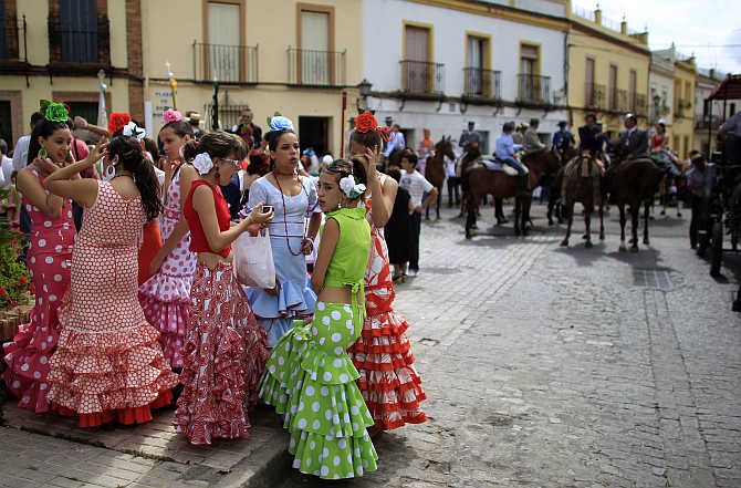 Pilgrims from the Gines brotherhood make their way to the shrine of El Rocio in Gines, near Seville, Spain.