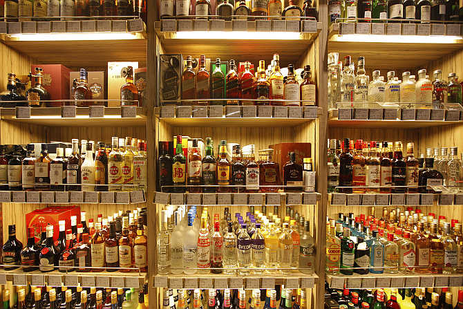 Bottles of whisky are displayed at a supermarket in Shanghai, China.