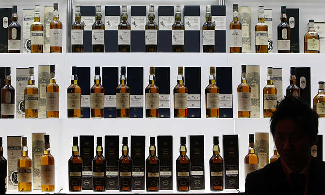 Bottles of malt whiskey are displayed at a whiskey merchandising event in Tokyo, Japan.