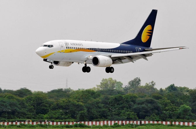 A Jet Airways passenger aircraft prepares to land at the airport.