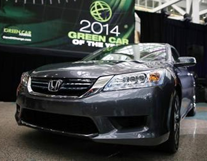  The 2014 Honda Accord Hybrid, which was named Green Car of the Year, is pictured at the Los Angeles Auto Show.