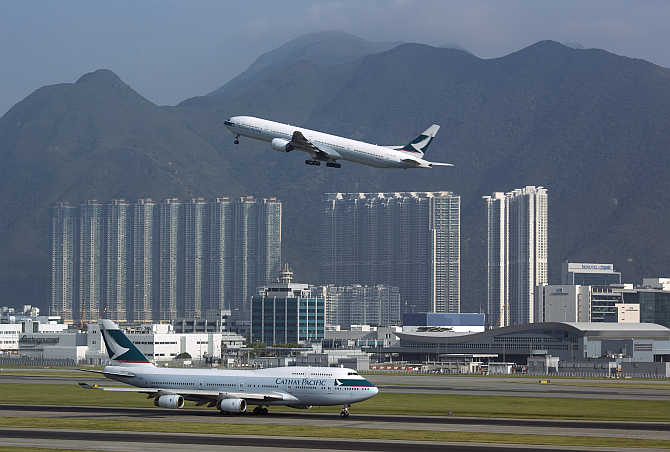 A Cathay Pacific Airways passenger plane takes off at the Hong Kong Airport.