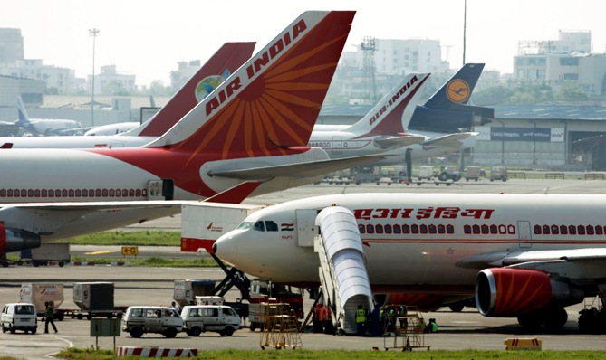 An Air India aircrafts stand on the tarmac at the airport in Mumbai.