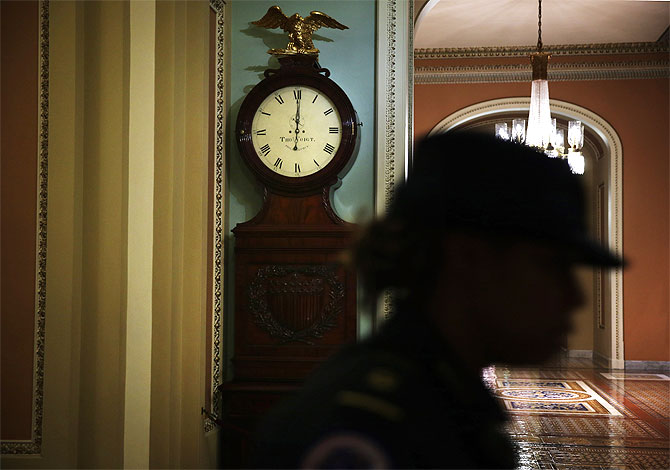  A Capitol Hill Police officer passes by the Ohio Clock.