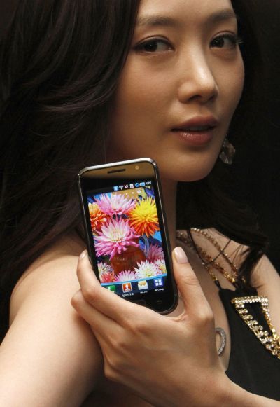 A model poses with the new Samsung smartphone during its launch ceremony.