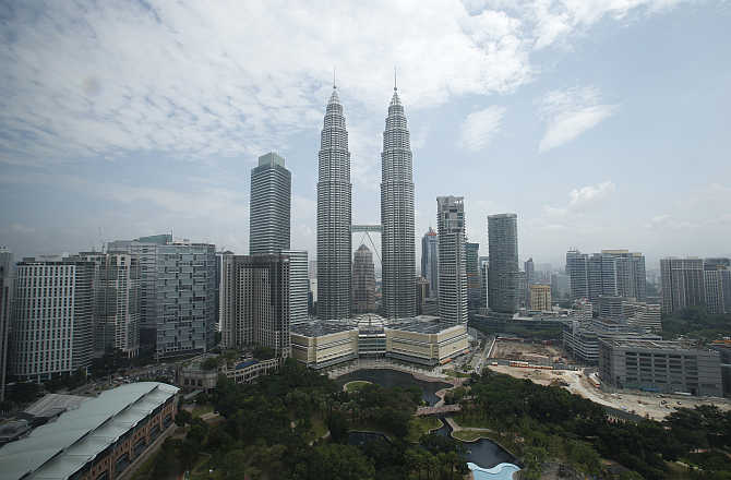 A view of Malaysia's landmark Petronas Twin Towers against an almost clear sky in Kuala Lumpur.