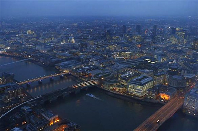 St Paul's cathedral and the financial district are seen at dusk in an aerial photograph from The View gallery at the Shard, western Europe's tallest building, in London.