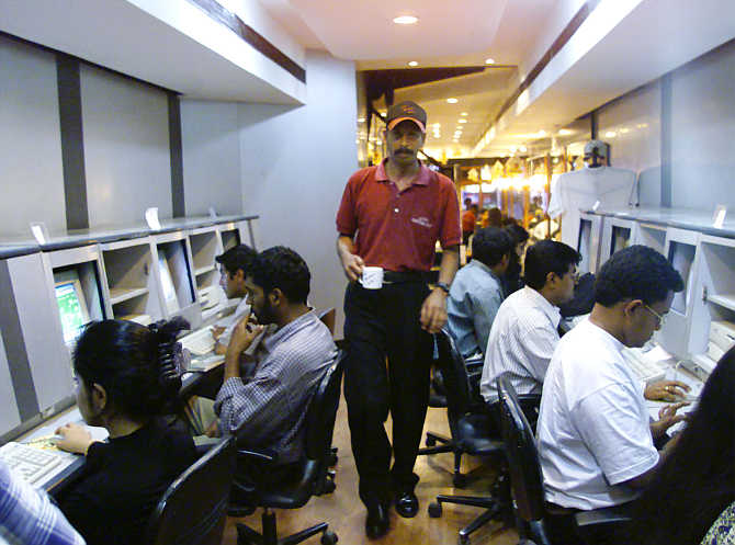 Employees at work at a business process outsourcing company.