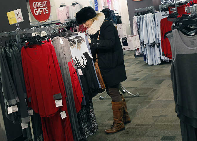A woman shops for jeans at a JC Penney store in New York City.