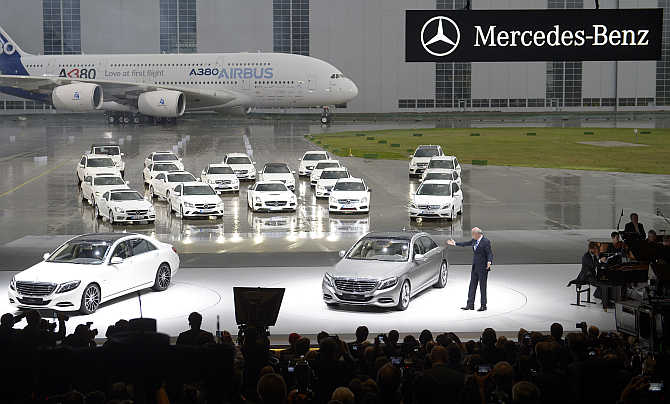 Dieter Zetsche, CEO of German carmaker Daimler, presents Mercedes-Benz S-class cars in front of an Airbus A380 during the presentation at the Airbus plant in Hamburg-Finkenwerder, Germany.