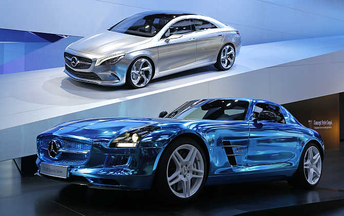 Mercedes-Benz Concept Style Coupe, up, model and a Mercedes-Benz SLS AMG Electric Drive model on display in Paris.
