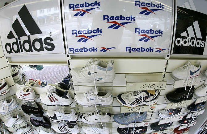 Sport shoes are displayed in a store in the northern German town of Hamburg.