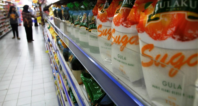 Bags of white sugar are displayed in a supermarket in Jakarta.