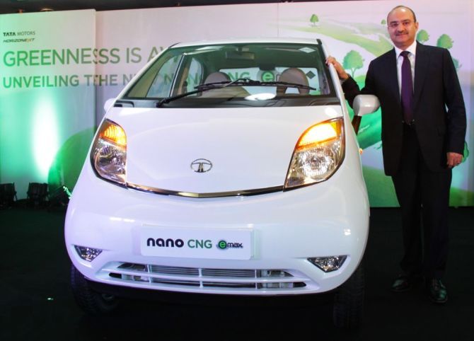 Ankush Arora, Senior Vice-President and Head-Strategy, Tata Motors Ltd, unveils Nano CNG version in Ahmedabad.