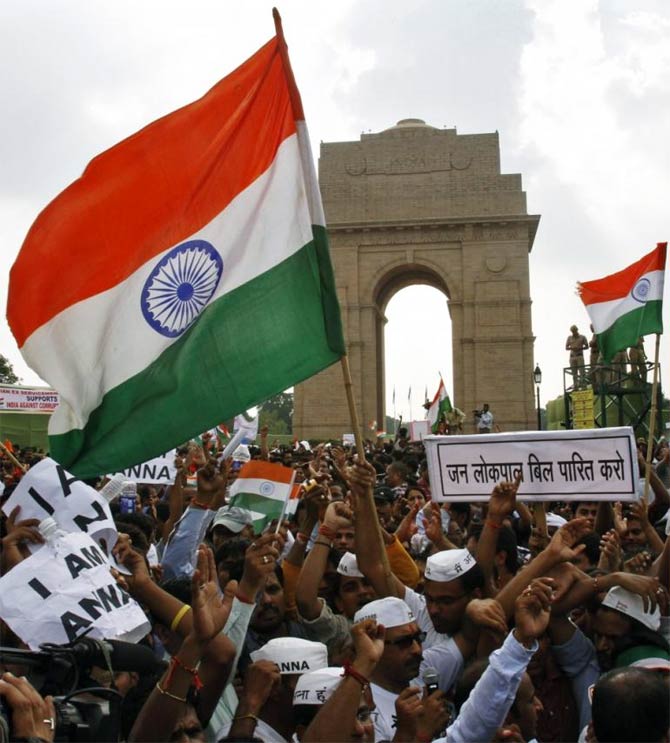Protestors shout slogans at India Gate, New Delhi.