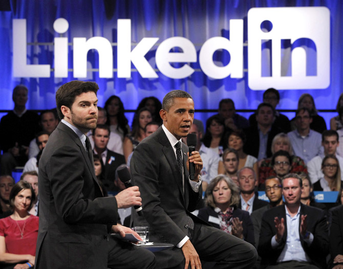 US President Barack Obama participates in a LinkedIn town hall-style meeting with Linked In CEO Jeff Weiner (L) in Mountain View, California.