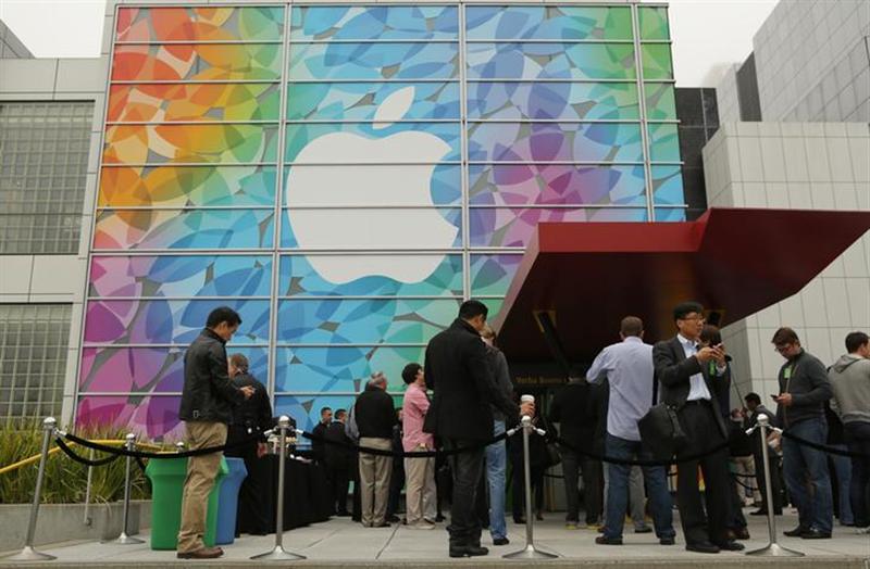 People line up for the Apple event at the Yerba Buena centre in San Francisco, California.