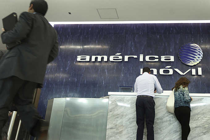 Logo of America Movil on the wall of the reception area in the company's corporate offices in Mexico City.
