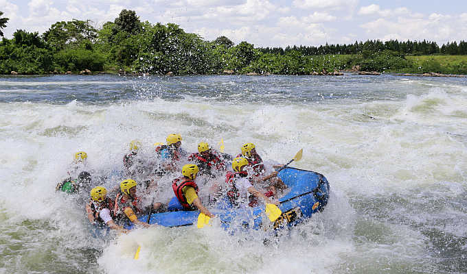 Tourists paddle their raft during white water rafting at Itanda falls on the River Nile near Jinja district, 109km east of the Ugandan capital of Kampala.