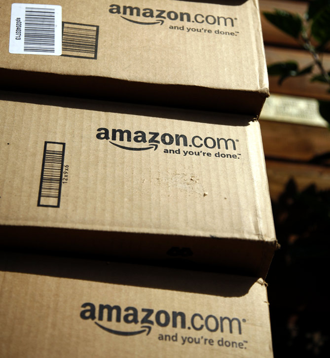 A stack of boxes from Amazon.com are pictured on the porch of a house in Golden, Colorado.