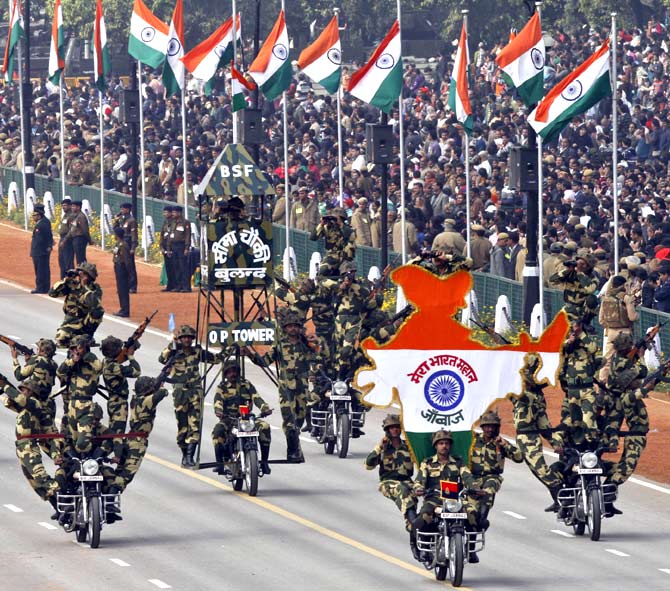 India's Border Security Force (BSF) Daredevils motorcycle riders perform as Republic Day parade in New Delhi 