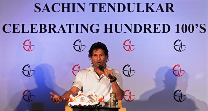 Sachin Tendulkar speaks during a news conference held to celebrate becoming the first player in history to score 100 centuries, in Mumbai March 25, 2012.