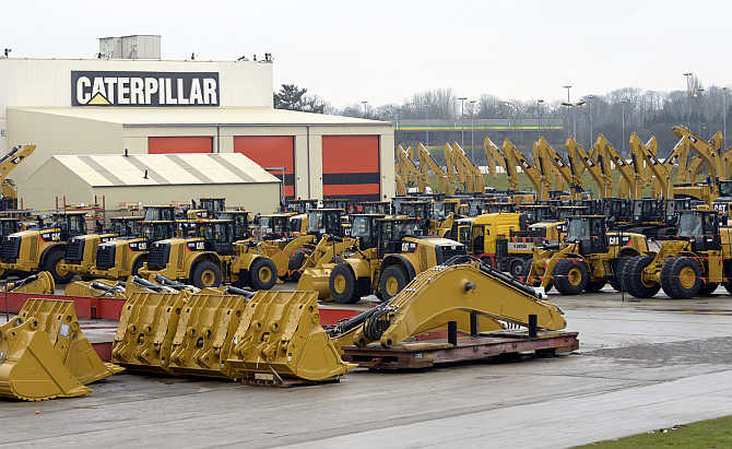 Caterpillar excavator machines are seen at a factory in Gosselies, Belgium.