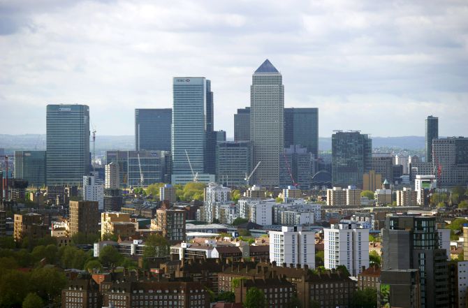 The Canary Wharf financial district is seen from the top of the ArcelorMittal Orbit in the London.