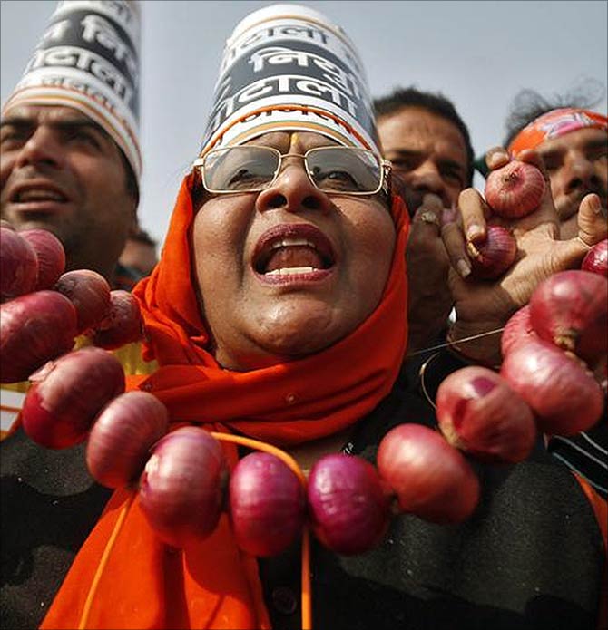 BJP activists protest against onion price rise.