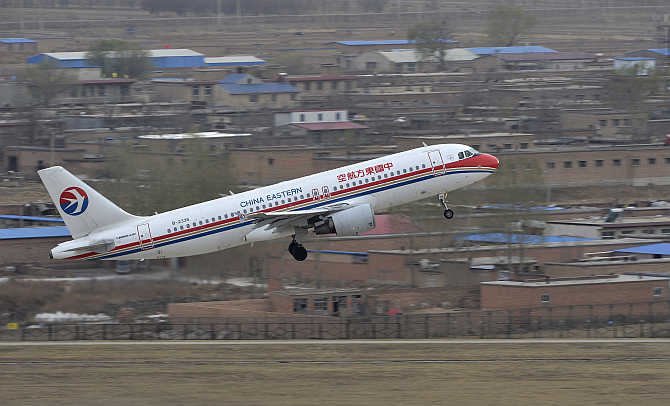 A China Eastern Airlines plane takes off at an airport in Taiyuan, Shanxi province, China.
