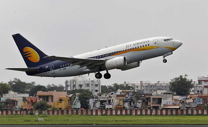 A Jet Airways passenger aircraft takes off from in Ahmedabad.