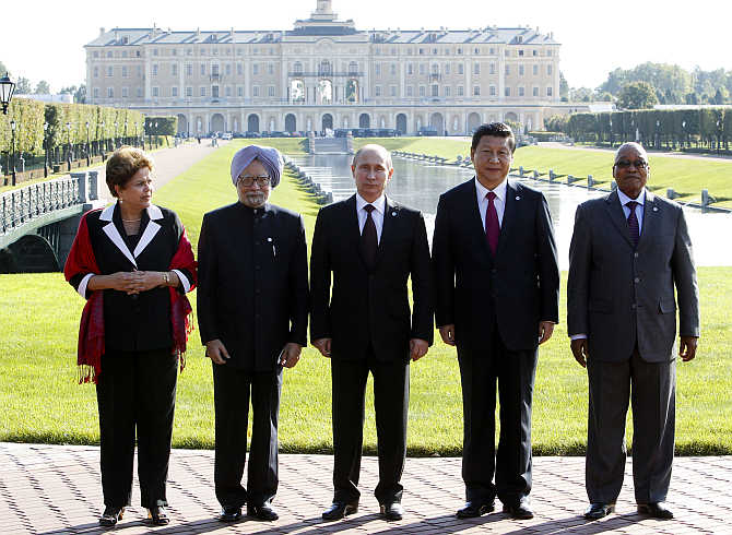 Brazil's President Dilma Rousseff, India's Prime Minister Manmohan Singh, Russia's President Vladimir Putin, China's President Xi Jinping and South African President Jacob Zuma, from left to right, at the G20 Summit in Strelna near St Petersburg, Russia.