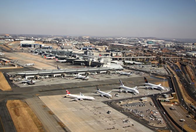 Oliver Tambo Airport surrounded by different modes of transportation and businesses - forming an Airport City.
