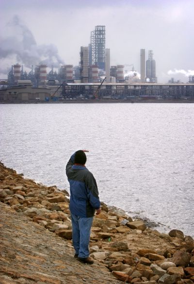 A man looks at Special Petrochemical Economic Zone.