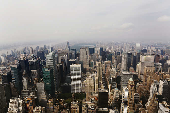 A view from the observation deck of the Empire State Building of midtown Manhattan, Rockefeller Center and Central Park in New York City, United States.